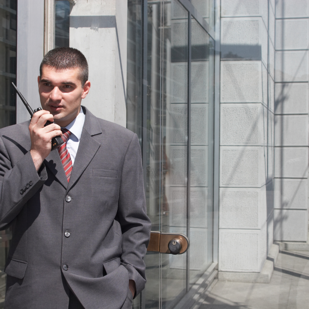 Trained security guard monitoring restricted area