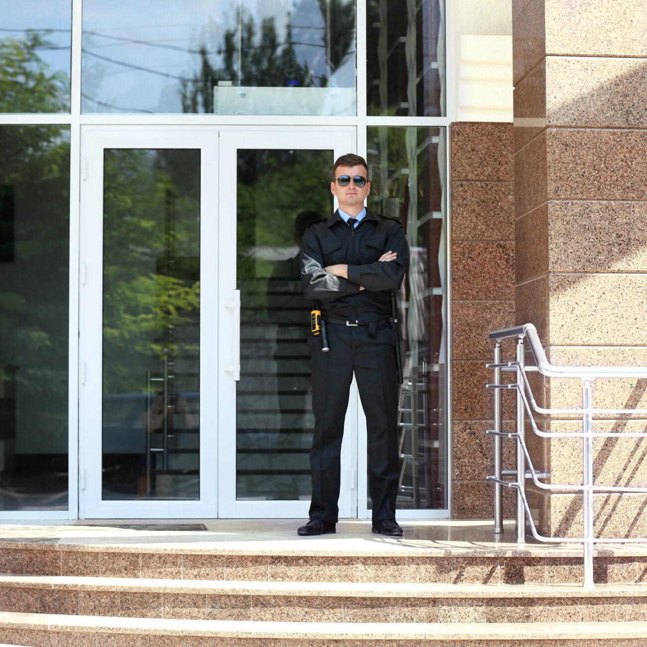 Security officer using modern surveillance technology